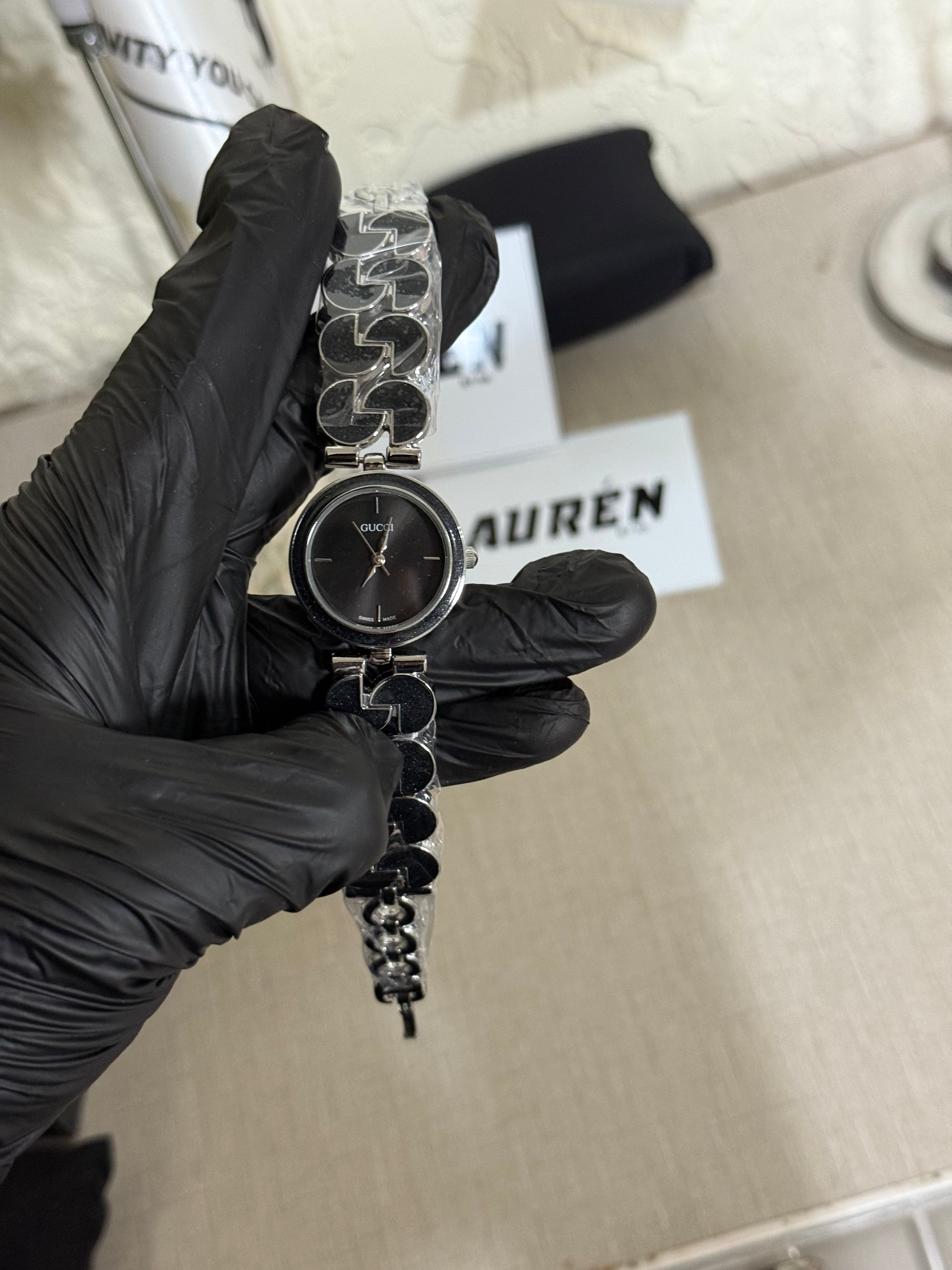 Black Gucci Ladies chain watch